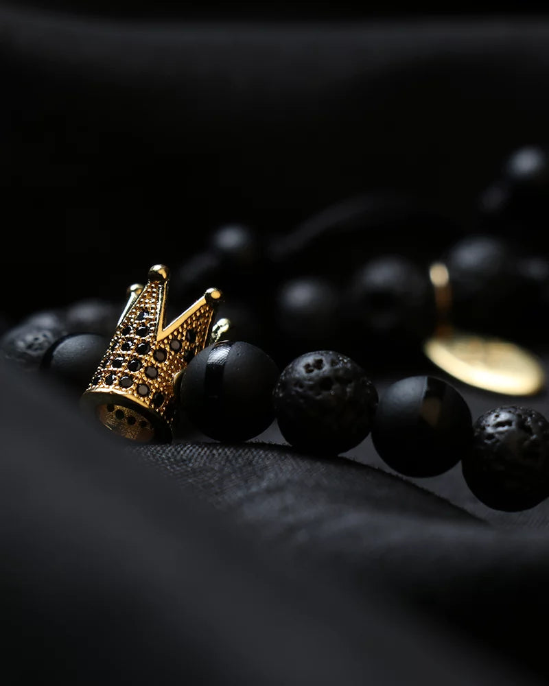 By Fabrizio Design Cagliari Adjustable Bracelet in Matte Onyx, Crown Charm, and Silver Volcanic Rock for Men & Women